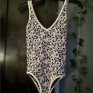 Leopard Print reversible body suit